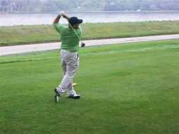 Darin Fisher playing golf.