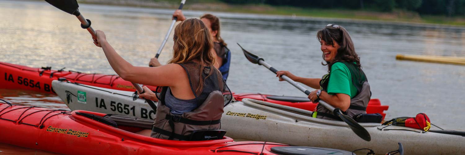 Group of people enjoying the kayak rentals on Rathbun Lake from Honey Creek Resort