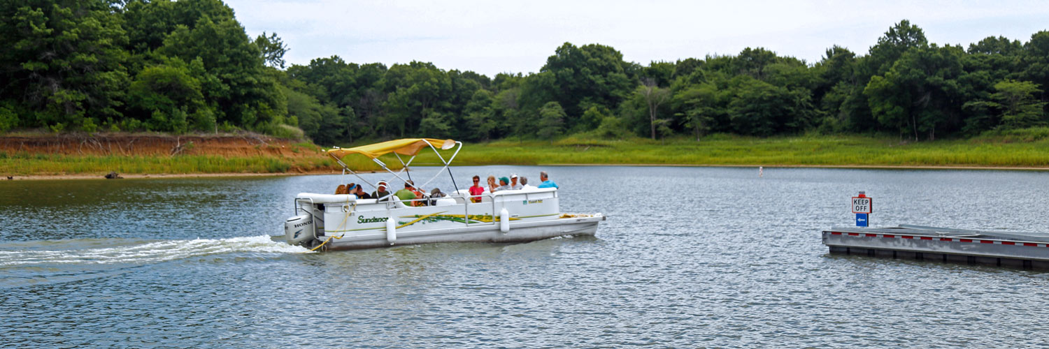 A pontoon boat rental at Honey Creek Resort on Rathbun Lake