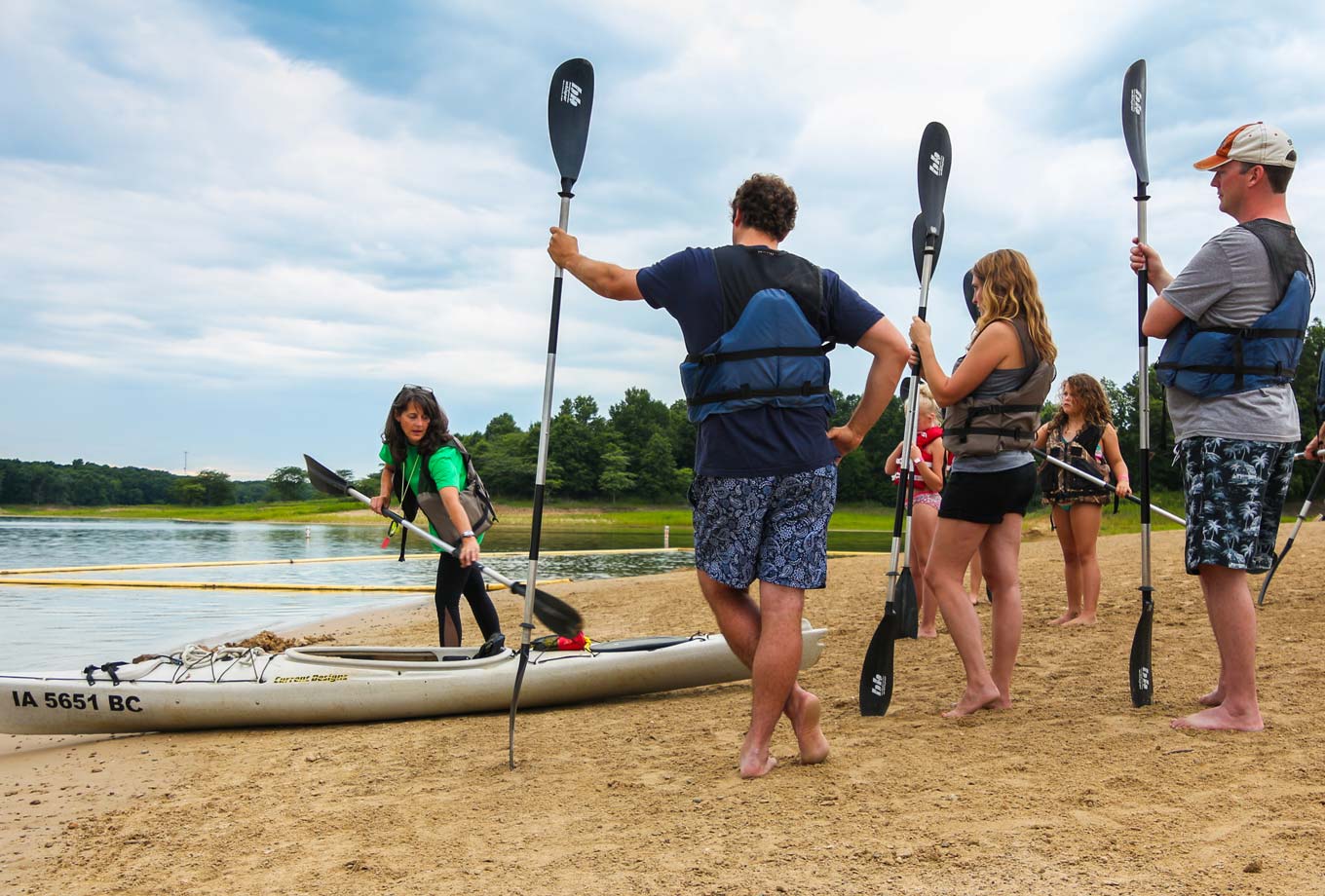 An instructor gives a kayaking lesson before going out on Rathbun Lake