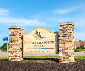 The entrance sign at Honey Creek Resort welcomes you