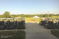 View of golf carts and a tent at The Preserve on Rathbun Lake during the 2018 Member-Guest Tournament