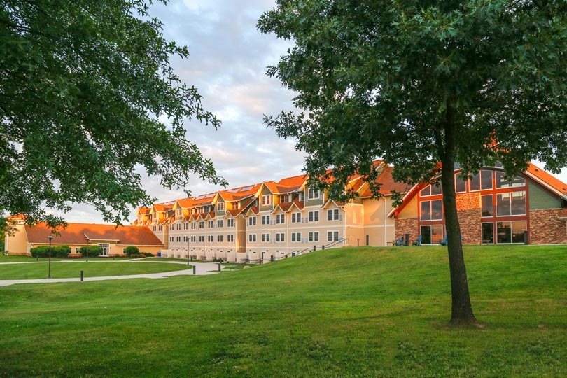Scenic view of the back of The Lodge on Rathbun Lake at Honey Creek Resort