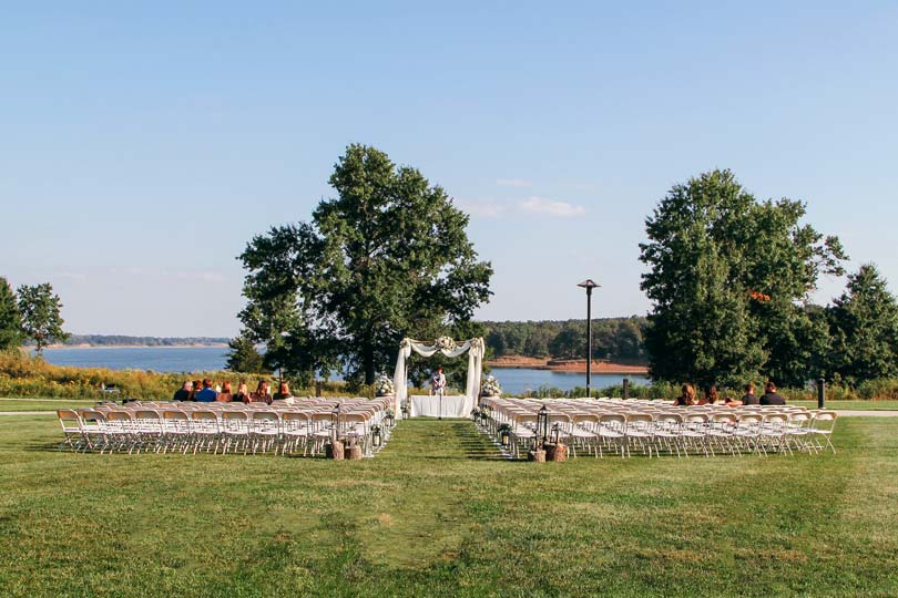 Wedding ceremony area on the lawn at Honey Creek overlooking Rathbun Lake