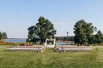 Wedding ceremony area on the lawn at Honey Creek overlooking Rathbun Lake