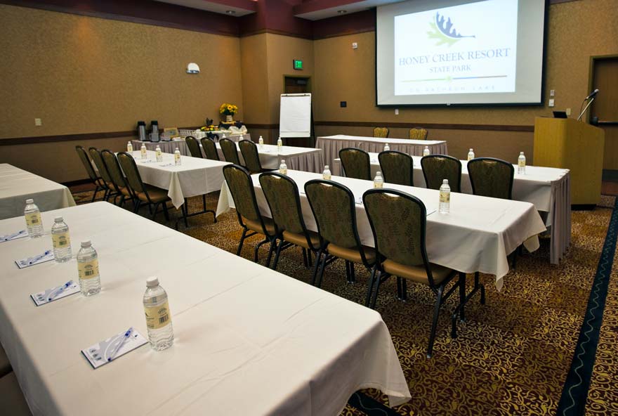Interior meeting space layout in one of the conference rooms at Honey Creek Resort in Iowa