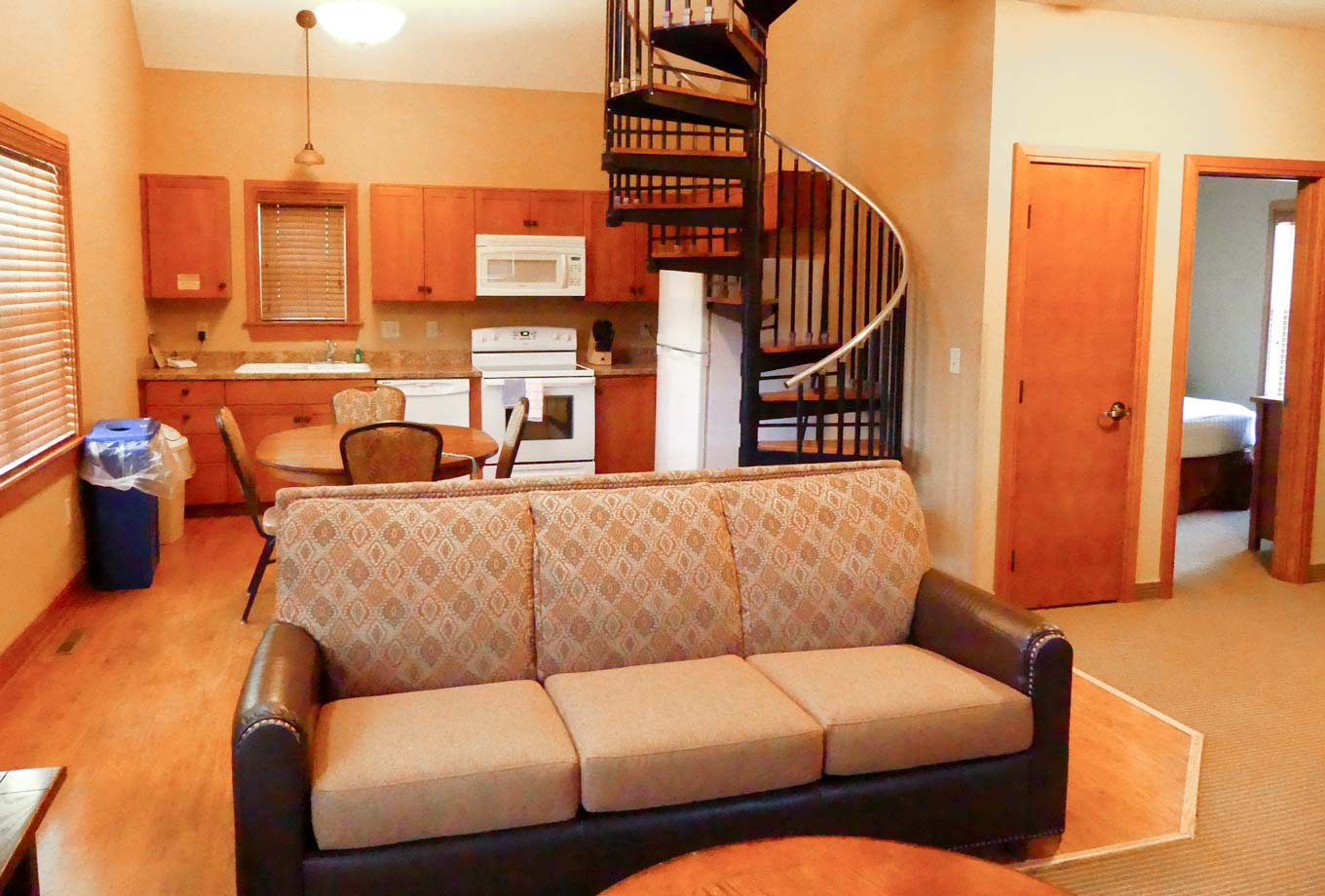 View of a cottage's beautiful, full kitchen at Honey Creek Resort