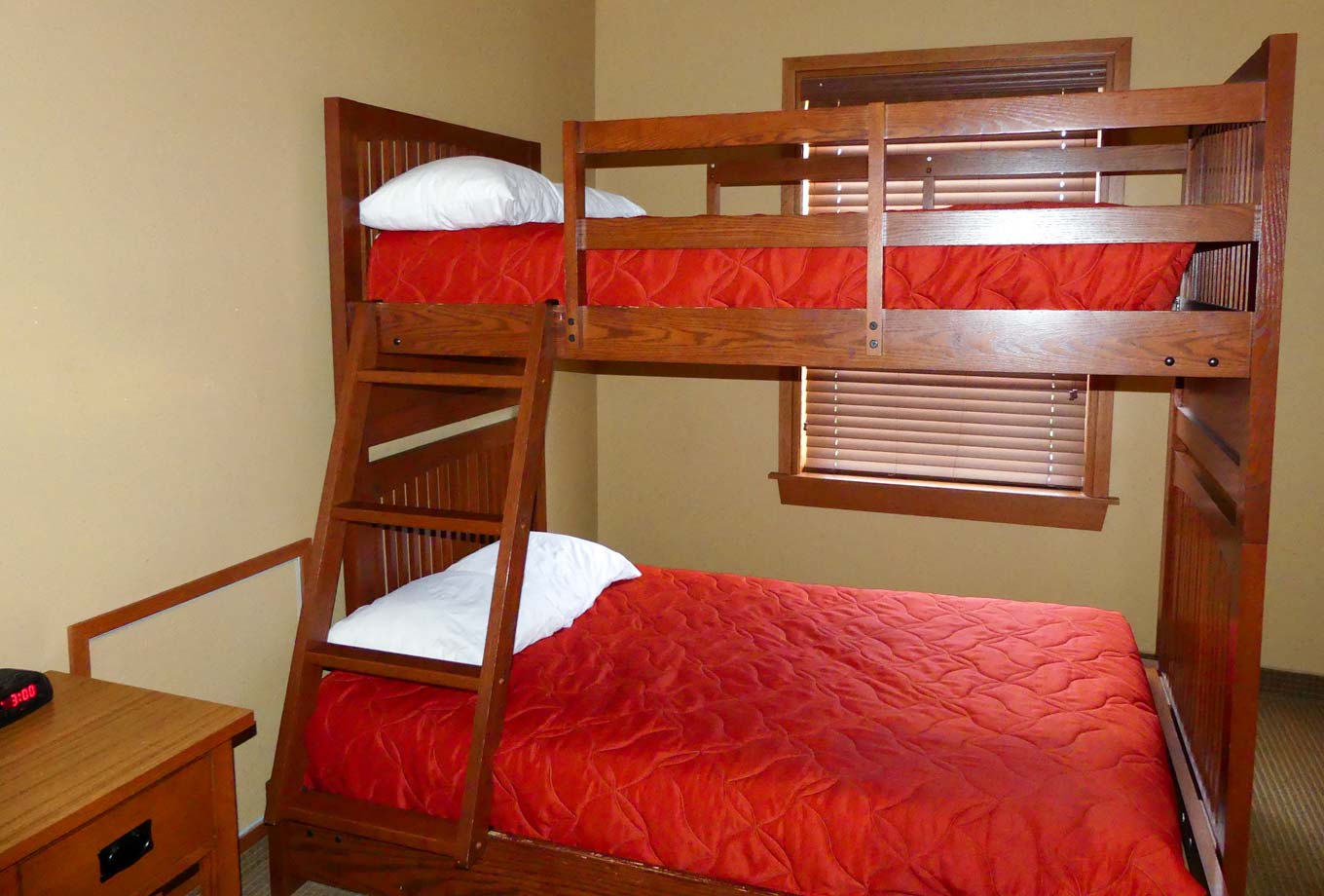 View of twin-over-full bunk bed in second bedroom of a two-bedroom cottage at Honey Creek Resort