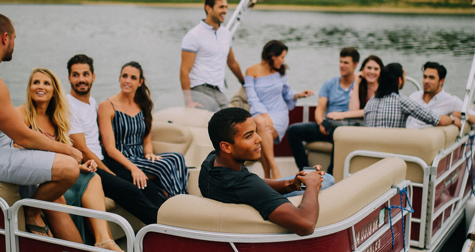 Group of young adults on a pontoon boat